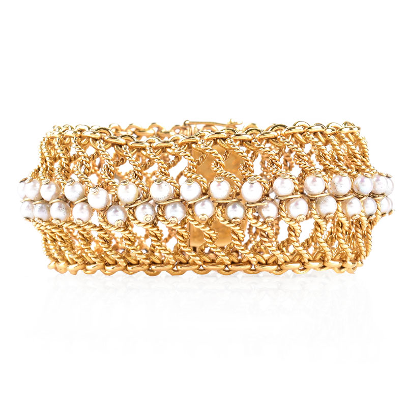 Retro 14 Karat Yellow Gold Woven Mesh Bracelet with Pearl Accents. Pearls measure 4mm, with good color and luster.