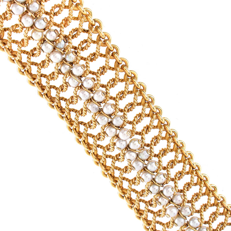 Retro 14 Karat Yellow Gold Woven Mesh Bracelet with Pearl Accents. Pearls measure 4mm, with good color and luster.