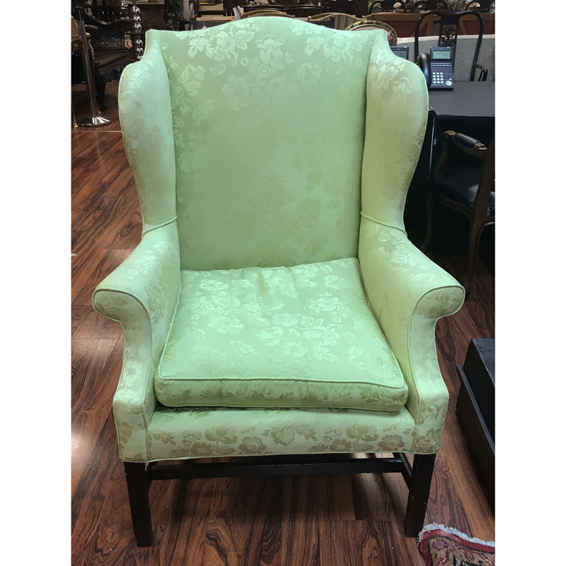 19th Century Wingback Chair on Carved Wood Stretcher.