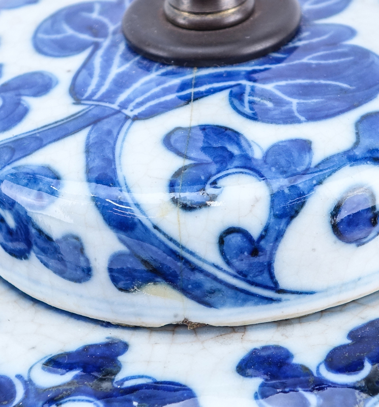 Pair of Chinese Blue and White Porcelain Covered Jars as Lamps. Crackle to glaze, light discoloration or else good condition.