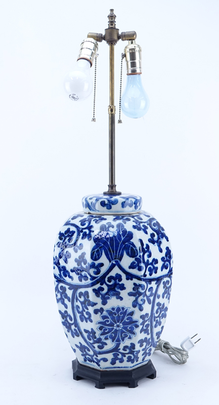 Pair of Chinese Blue and White Porcelain Covered Jars as Lamps. Crackle to glaze, light discoloration or else good condition.