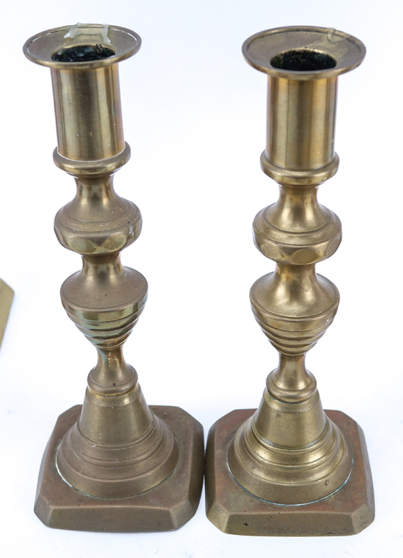 Ten (10) Piece Brass Candlestick Lot. Unsigned. Various sizes from 10" to 8".