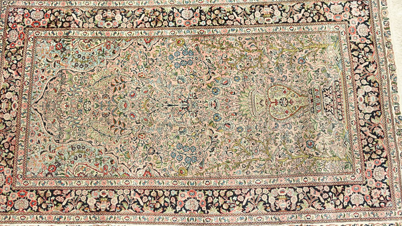 Semi Antique Persian Style Silk Rug. Wear consistent with age, discoloration, wear to fringes, needs cleaning. 