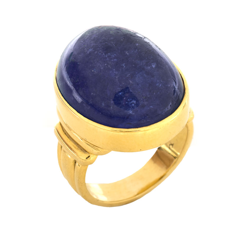 Vintage Approx. 30.0-35.0 Carat Oval Cabochon Tanzanite and 18 Karat Yellow Gold Ring.