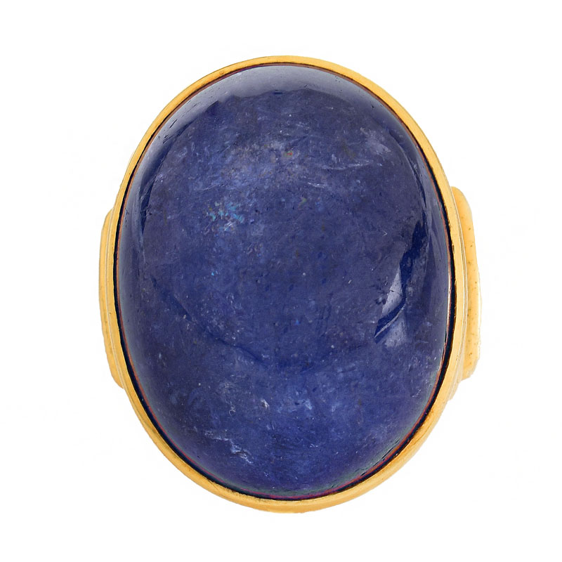 Vintage Approx. 30.0-35.0 Carat Oval Cabochon Tanzanite and 18 Karat Yellow Gold Ring.