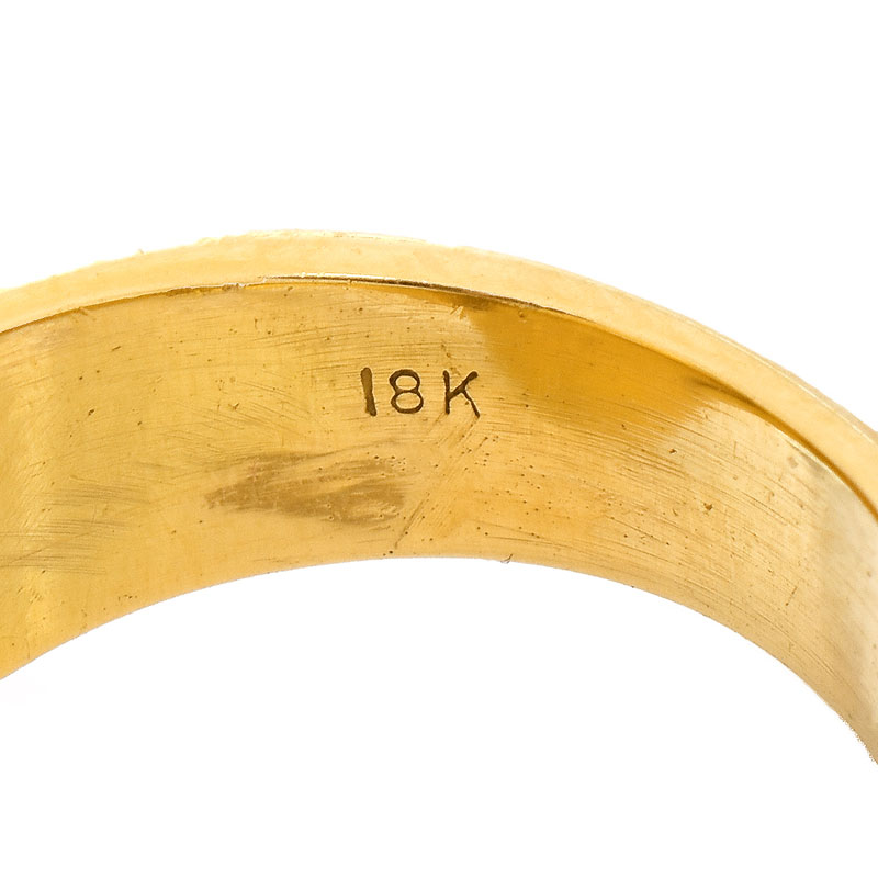 Vintage Approx. 30.0-35.0 Carat Oval Cabochon Tanzanite and 18 Karat Yellow Gold Ring.