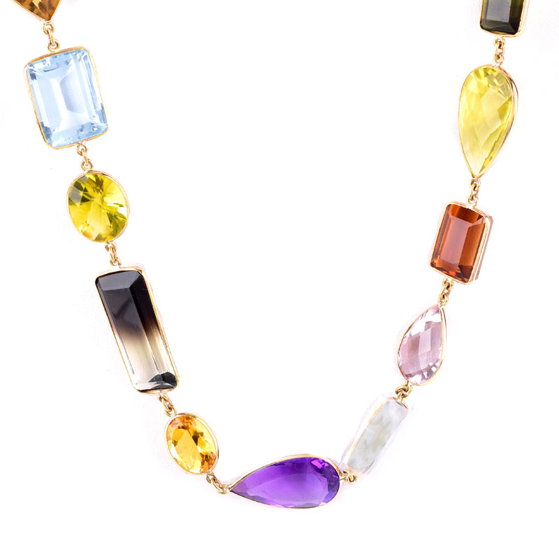 Vintage Multi-cut Multi-color Semi-Precious Gemstone and 18 Karat Yellow Gold Necklace.