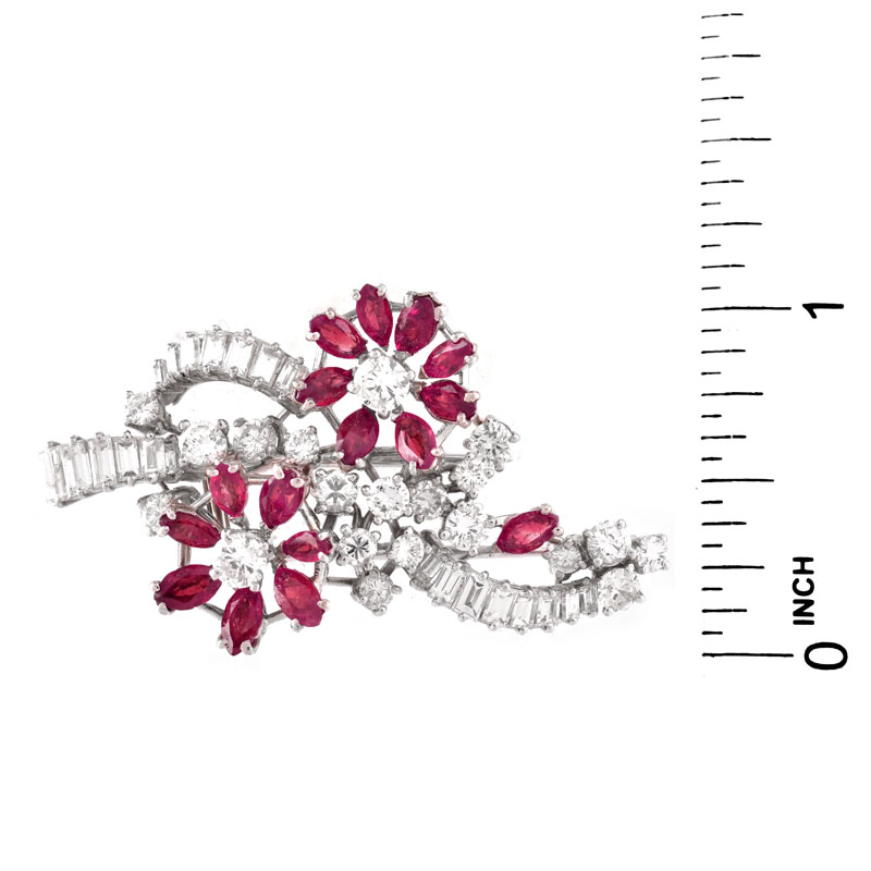 Vintage Round Brilliant and Baguette Cut Diamond, Oval Cut Ruby and Platinum Brooch. Fine quality stones throughout.