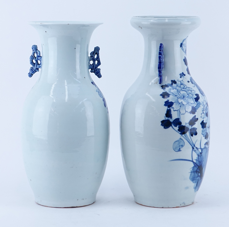 Two (2) Chinese Porcelain Tall Blue & White Vases. Each with bird and flower motif. Handles. Unsigned.