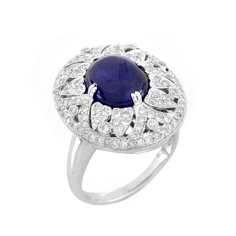 Approx. 6.27 Carat Oval Cabochon Sapphire, 1.50 Carat Round Brilliant Cut Diamond and 18 Karat White Gold Ring.