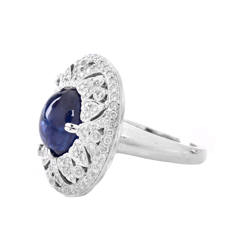 Approx. 6.27 Carat Oval Cabochon Sapphire, 1.50 Carat Round Brilliant Cut Diamond and 18 Karat White Gold Ring.