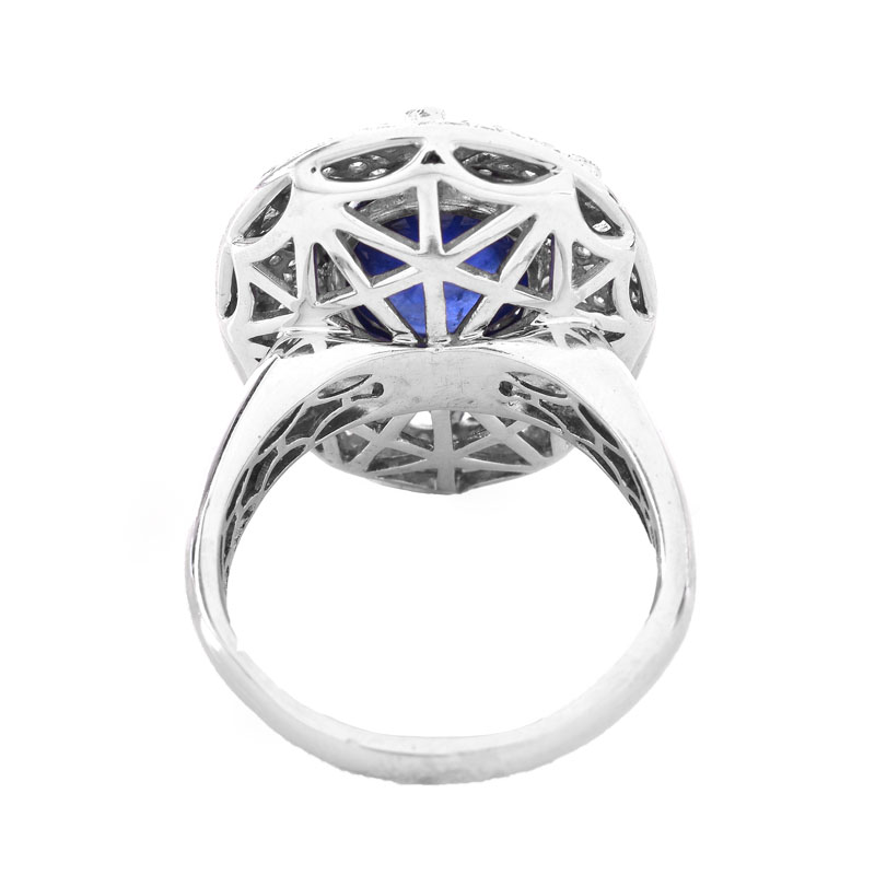 Approx. 6.27 Carat Oval Cabochon Sapphire, 1.50 Carat Round Brilliant Cut Diamond and 18 Karat White Gold Ring.