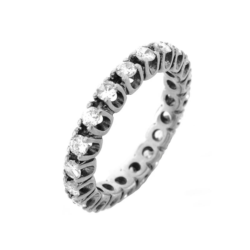 Vintage Approx. 1.0 Carat Round Brilliant Cut Diamond and 14 Karat White Gold Eternity Band.