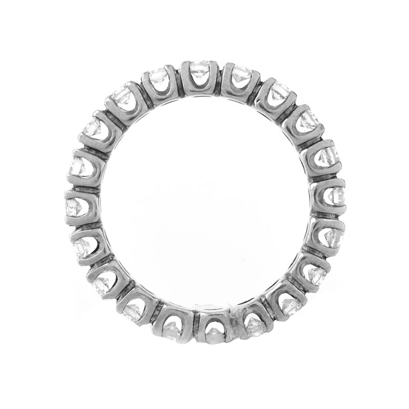 Vintage Approx. 1.0 Carat Round Brilliant Cut Diamond and 14 Karat White Gold Eternity Band.