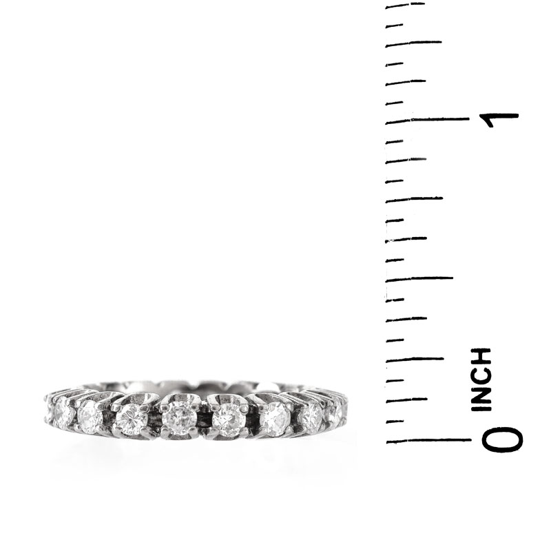 Vintage Approx. 1.0 Carat Round Brilliant Cut Diamond and 14 Karat White Gold Eternity Band.