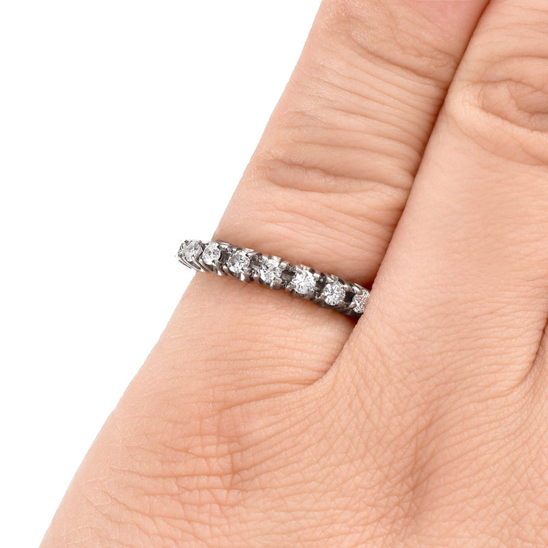 Vintage Approx. 1.0 Carat Round Brilliant Cut Diamond and 14 Karat White Gold Eternity Band.