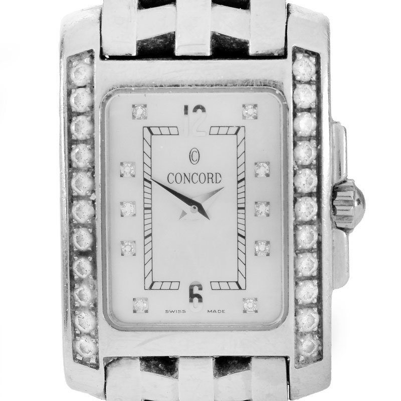 Lady's Vintage Concord Sportivo Stainless Steel Bracelet Watch with Diamond Bezel, Mother of Pearl Dial and Quartz Movement.