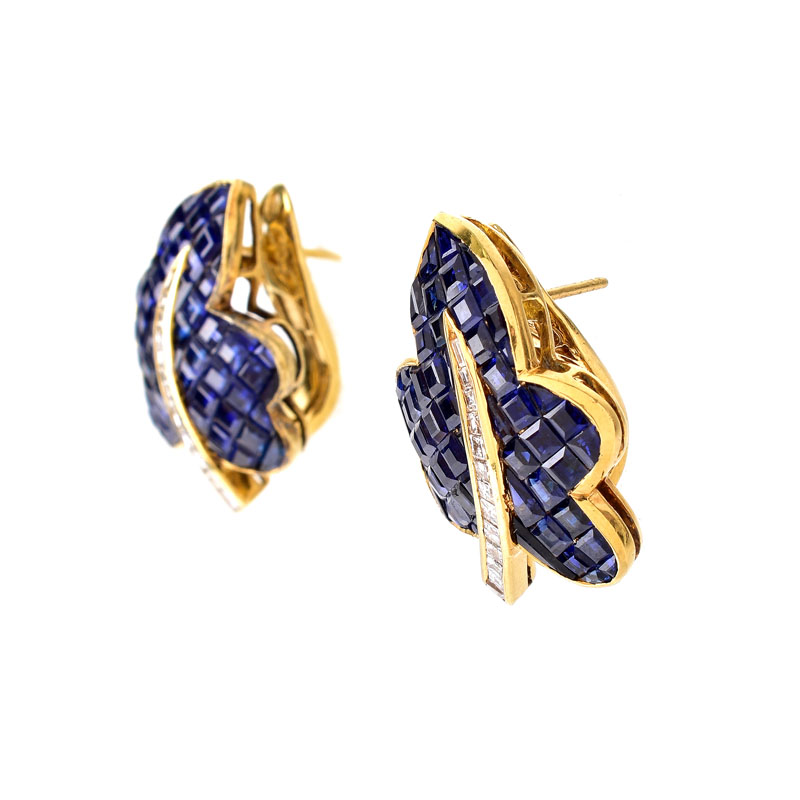Invisible Set Square Cut Sapphire, Diamond and 18 Karat Yellow Gold Leaf Form Earrings. Sapphires with vivid color. Unsigned.