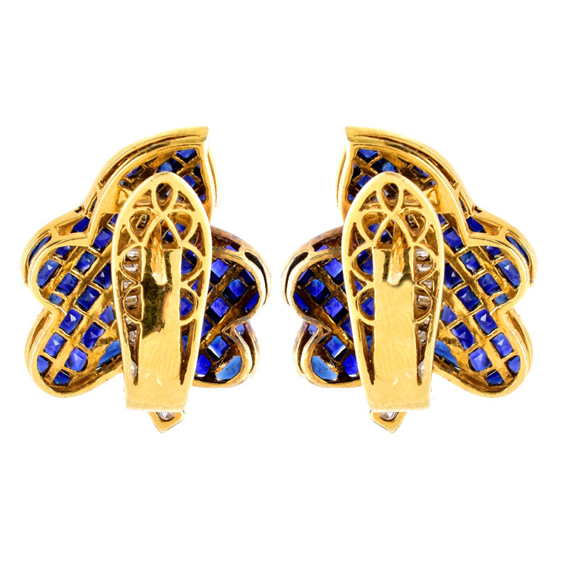 Invisible Set Square Cut Sapphire, Diamond and 18 Karat Yellow Gold Leaf Form Earrings. Sapphires with vivid color. Unsigned.