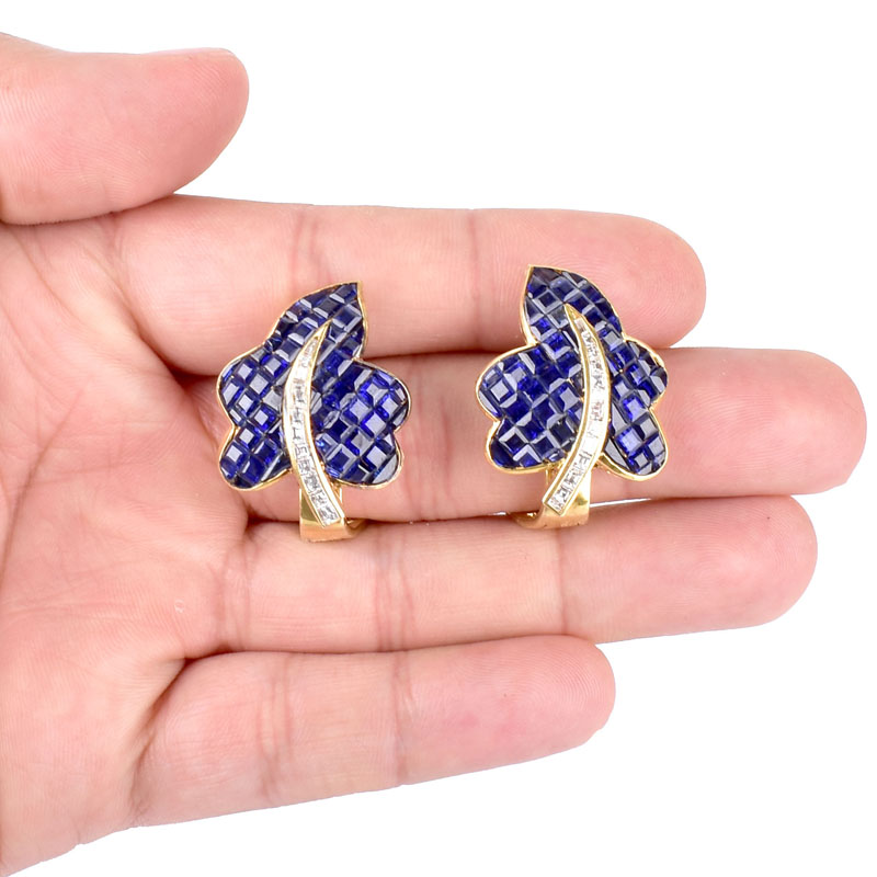 Invisible Set Square Cut Sapphire, Diamond and 18 Karat Yellow Gold Leaf Form Earrings. Sapphires with vivid color. Unsigned.