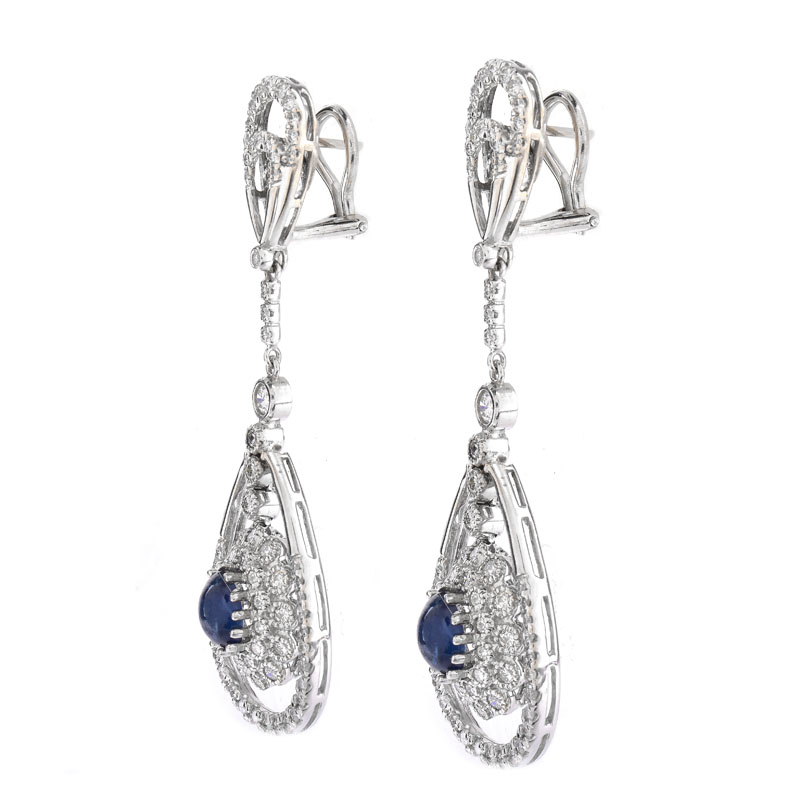 Approx. 2.0 Carat TW Oval Cabochon Sapphire, 2.50 Carat Round Brilliant Cut Diamond and 18 Karat White Gold Pendant Earrings.