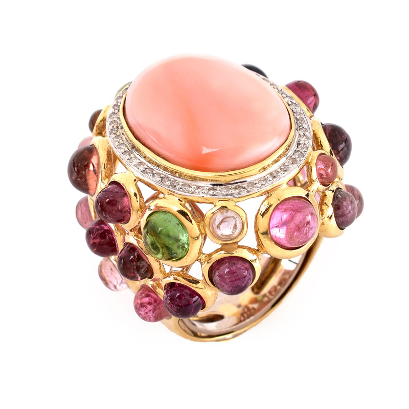 Vintage Angel Skin Coral, Cabochon Tourmaline,  Diamond and 14 Karat Yellow Gold Ring. Coral measures 19mm x 14mm.