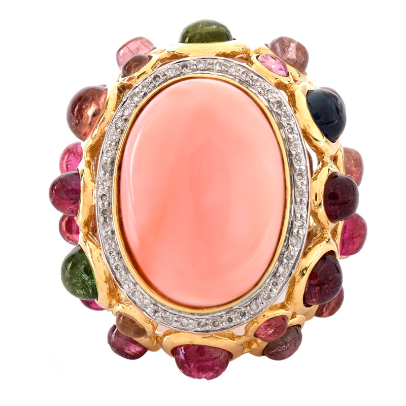 Vintage Angel Skin Coral, Cabochon Tourmaline,  Diamond and 14 Karat Yellow Gold Ring. Coral measures 19mm x 14mm.