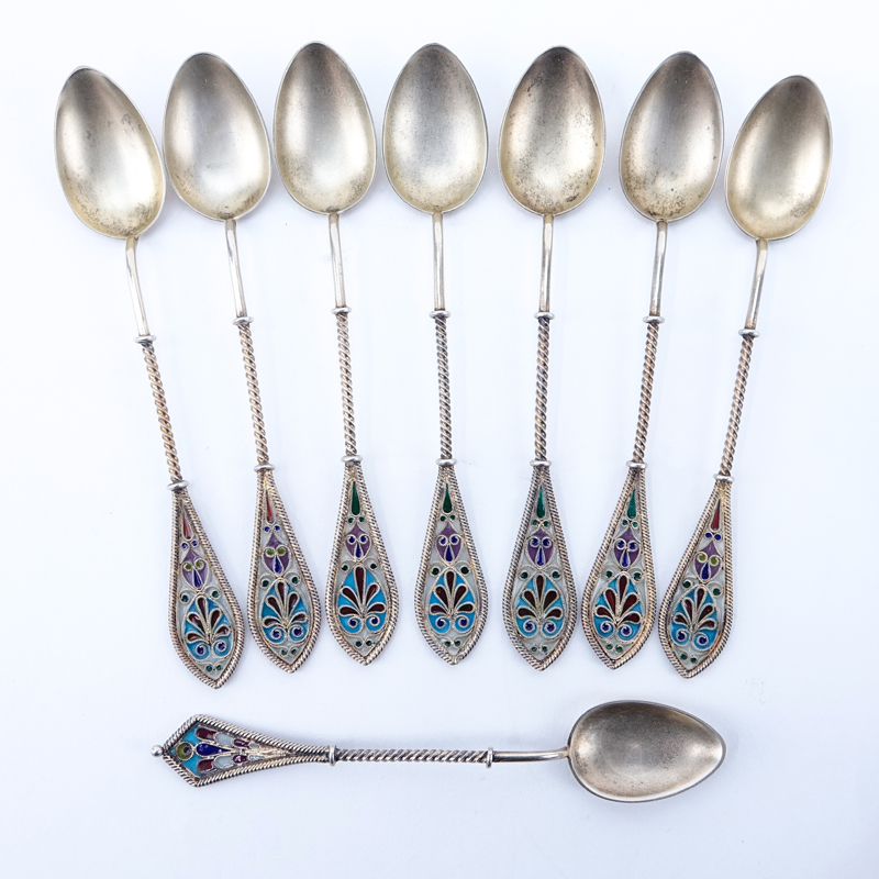 Collection Of Eight (8) Gilt Silver Plique-à-jour Spoons. seven matching measure 4-3/4", one at 4-1/4". Unsigned.
