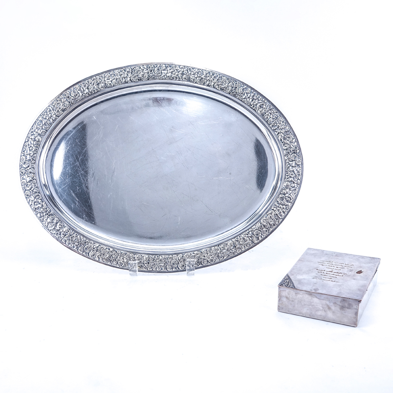 Tiffany & Co. Silver Plate Oval Tray and Cigarette Box. The tray with a floral repousse border, the box lid and engraved printer plate with invitation.