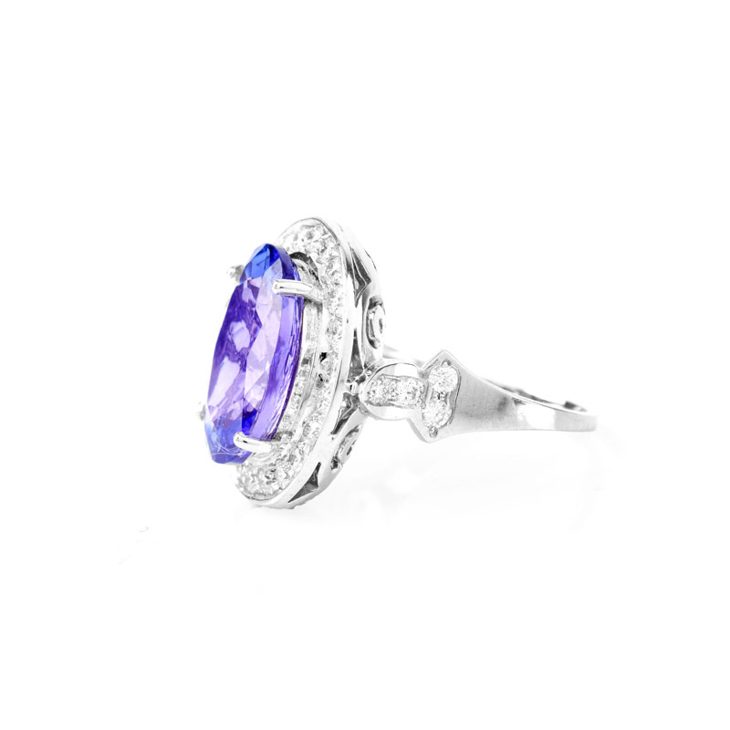 AIGL Certified 7.0 Carat Oval Cut Tanzanite, .70 Carat Diamond and 14 Karat White Gold Ring. 