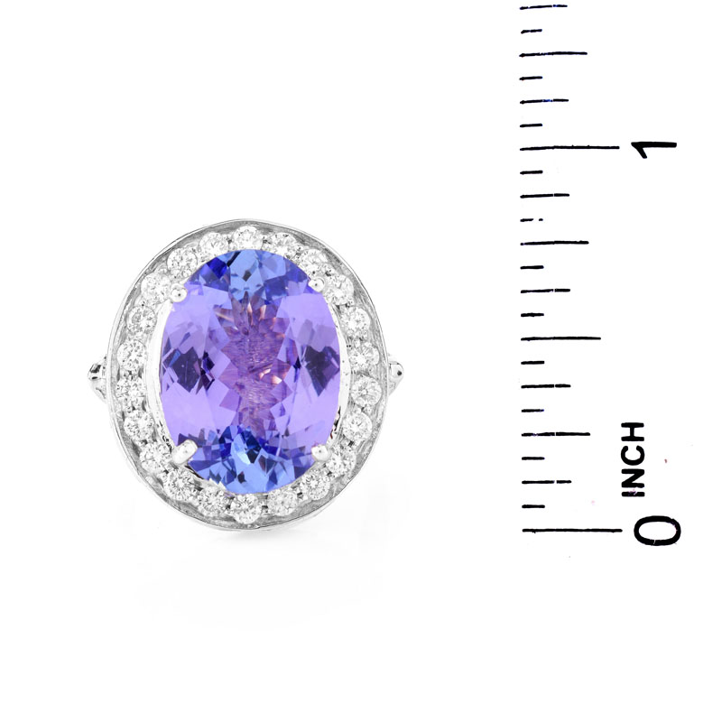 AIGL Certified 7.0 Carat Oval Cut Tanzanite, .70 Carat Diamond and 14 Karat White Gold Ring. 