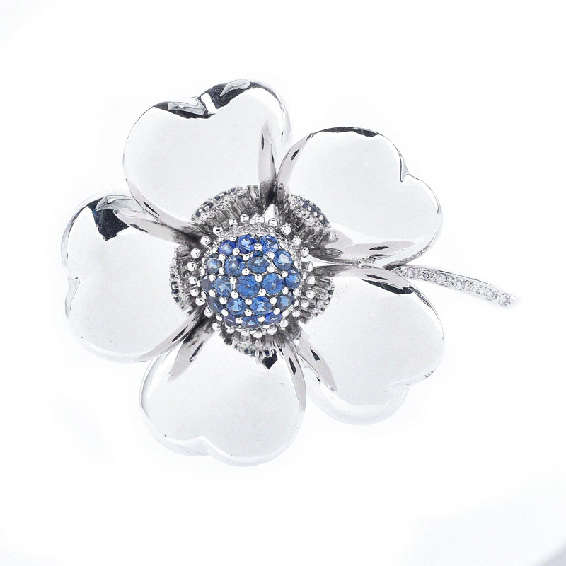 Vintage Approx. 2.0 Carat Round Cut Sapphire, Diamond and 14 Karat White Gold Flower Brooch.