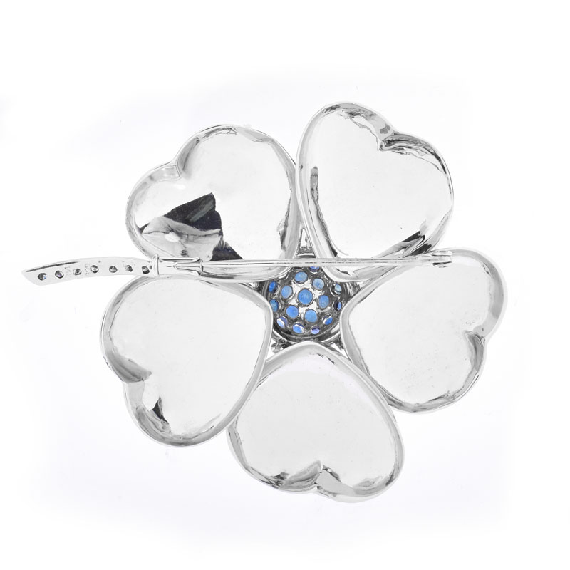 Vintage Approx. 2.0 Carat Round Cut Sapphire, Diamond and 14 Karat White Gold Flower Brooch.