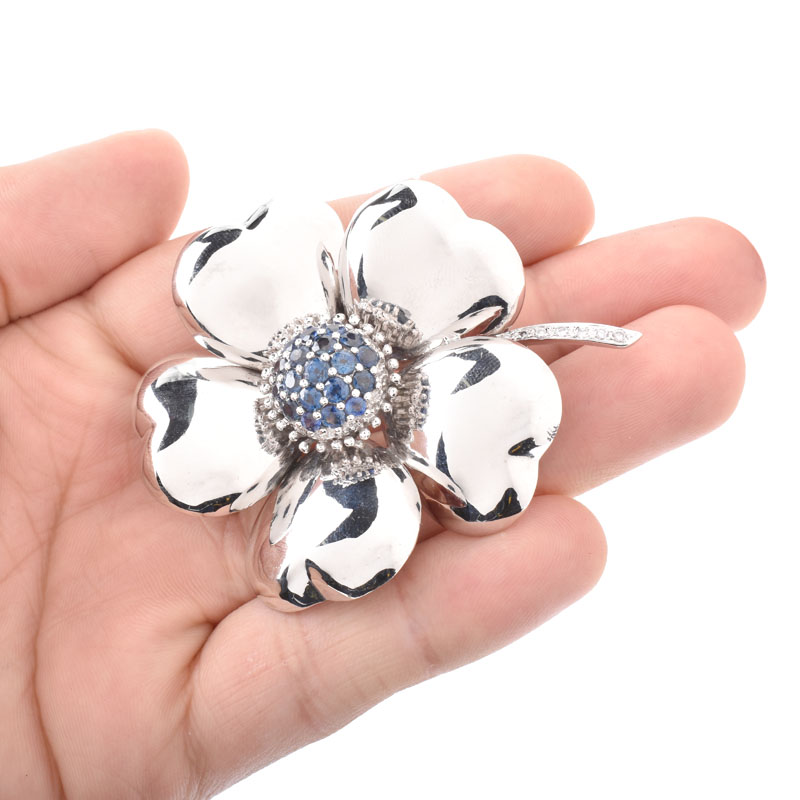 Vintage Approx. 2.0 Carat Round Cut Sapphire, Diamond and 14 Karat White Gold Flower Brooch.