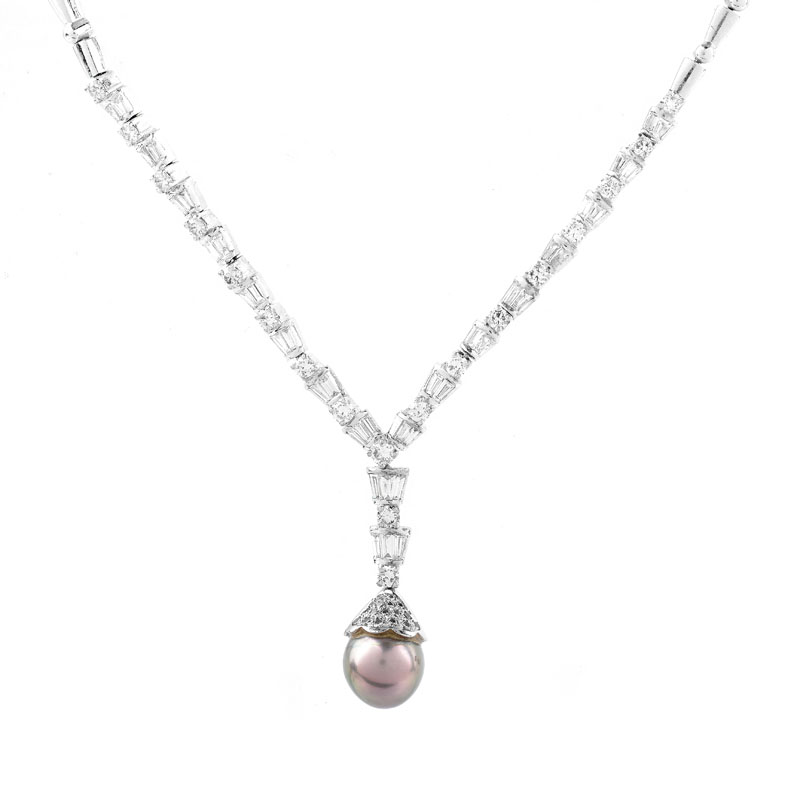 Approx. 3.0 Carat Baguette and Round Brilliant Cut Diamond, South Sea Pearl and 18 Karat White Gold Pendant Necklace.