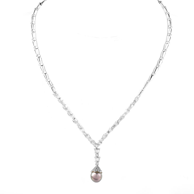 Approx. 3.0 Carat Baguette and Round Brilliant Cut Diamond, South Sea Pearl and 18 Karat White Gold Pendant Necklace.