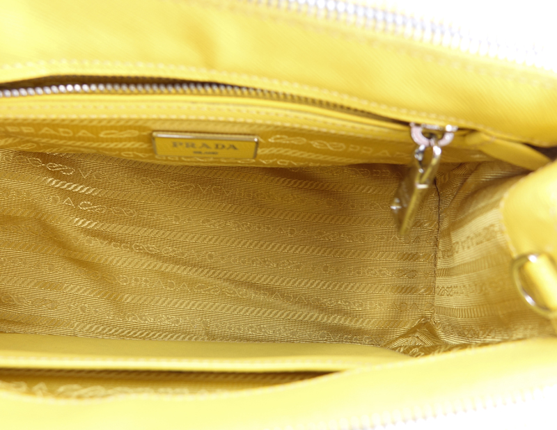 Prada Yellow Small Grained Leather Saffiano Lux Handbag.