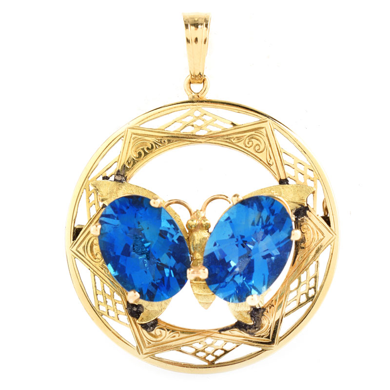 Vintage Oval Cut London Blue Topaz and 14 Karat Yellow Gold Butterfly Pendant / Brooch.