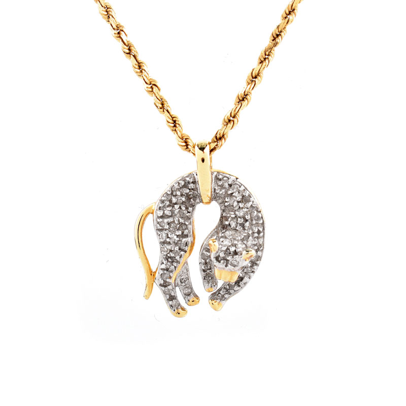 Vintage Pave Set Diamond and 14 Karat Yellow and White Gold Cat Pendant Necklace.