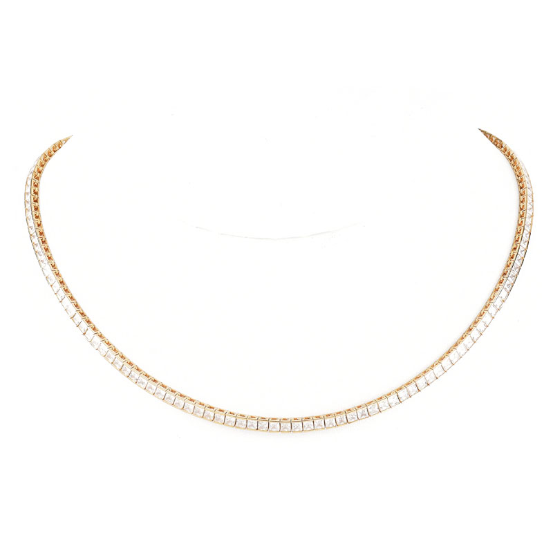Contemporary 14 Karat Yellow Gold and Cubic Zirconia Group Including Necklace, Bracelet and Earrings.