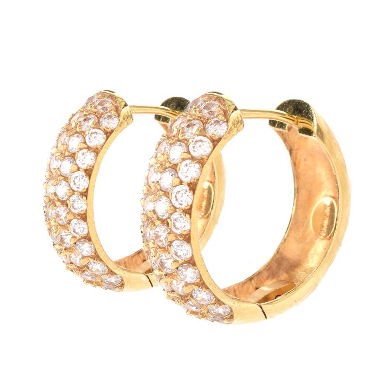 Contemporary 14 Karat Yellow Gold and Cubic Zirconia Group Including Necklace, Bracelet and Earrings.