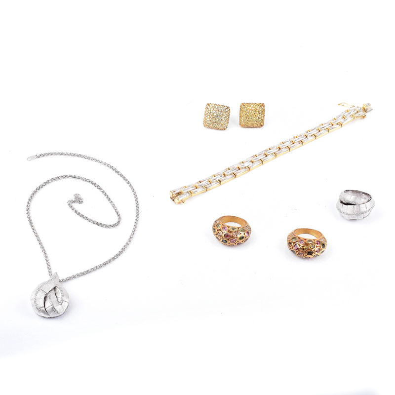 Collection of Sterling Silver Jewelry Including a Bracelet with Baguette Faux Diamonds, Pair of Earrings with Faux Yellow Diamonds, Two (2) Rings with Multi Color Faux Gemstones, Pendant Necklace and Ring Suite with Faux Diamonds.