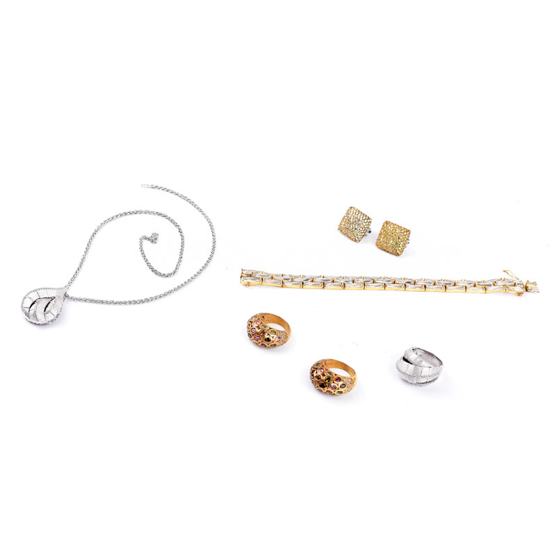 Collection of Sterling Silver Jewelry Including a Bracelet with Baguette Faux Diamonds, Pair of Earrings with Faux Yellow Diamonds, Two (2) Rings with Multi Color Faux Gemstones, Pendant Necklace and Ring Suite with Faux Diamonds.