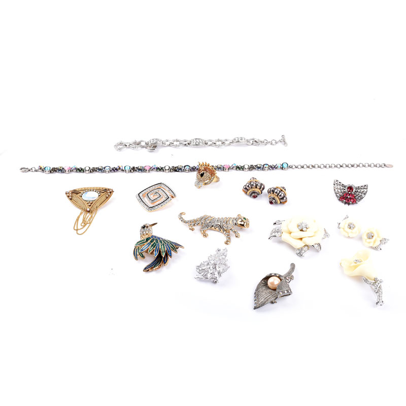 Collection of Costume Jewelry Including Brooches, Bracelet, Ring, Necklace, and Earrings.