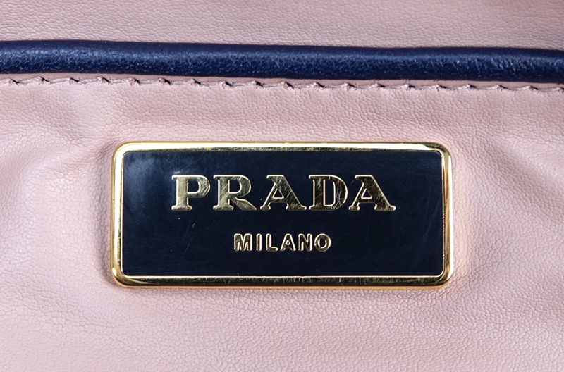 Prada Blue and White Tweed Flap Bag. Black lucite chain and hardware. Blue and pink leather interior with zipper pocket.