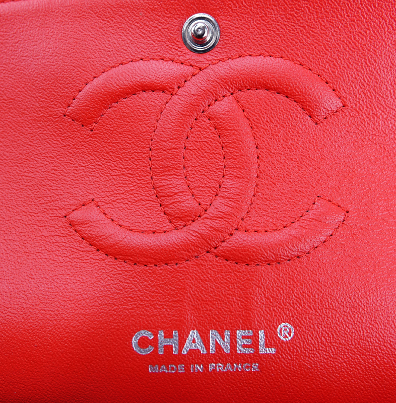 Chanel Red Quilted Patent Leather Classic Double Flap 26 Bag. Silver tone hardware, interior of red leather with zippered and patch pockets.