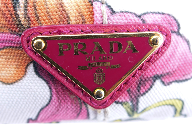 Prada Multi-Colored Floral Motif Canvas Canapa Mini Tote. Gold tone hardware, interior of pink canvas with zippered and patch pockets.