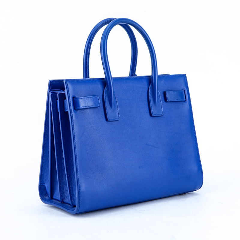 Saint Laurent Electric Blue Smooth Calf Leather Sac De Jour Baby PM. Gold tone hardware. Black leather interior with slot pocket.