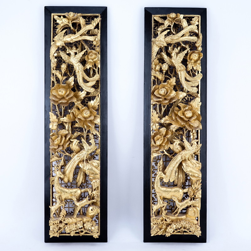 Pair of Chinese Giltwood Deep Relief Carved Panels.