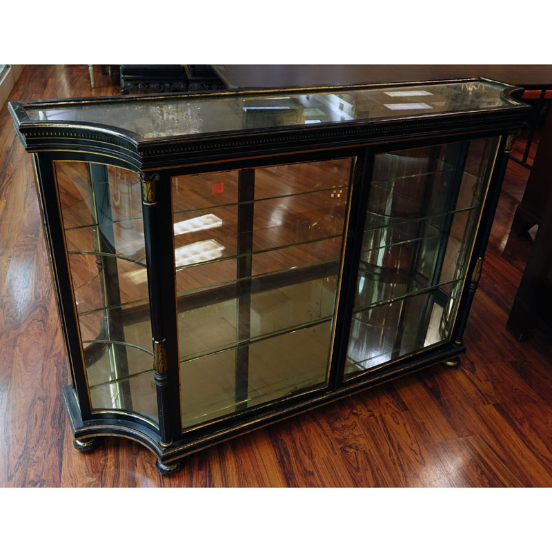 Early to Mid 20th Century English Regency Style Ebonized and Gilt Painted Two Door Credenza with Mirrored Top.